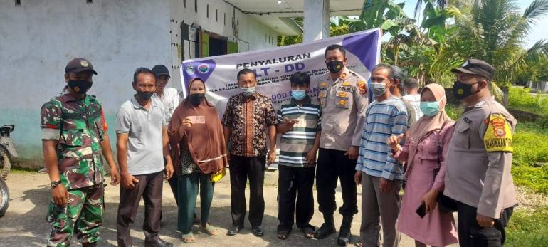 Bantuan BLT-DD Tahap I Dan Vaksinasi Oleh Polres Seluma